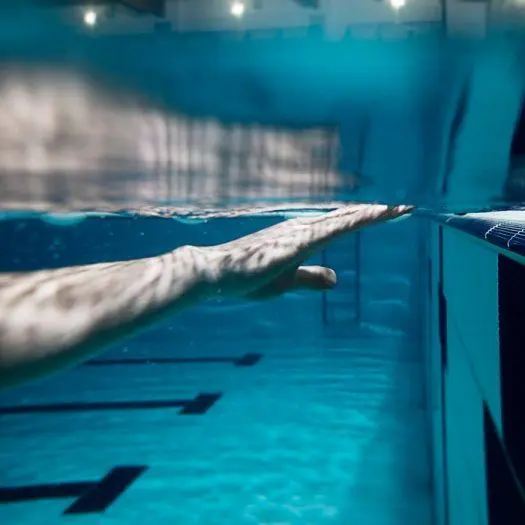 Swimmer profile card in the Swimmy app